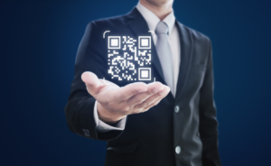 man holding qr code